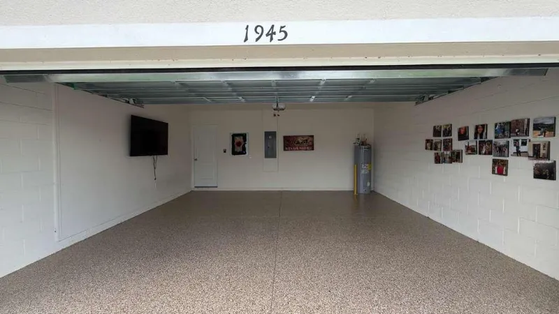 Same garage with a beige flake epoxy floor installed by Epoxy One