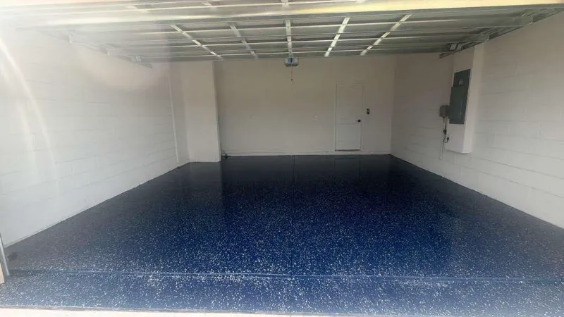 Blue flake epoxy garage floor installed by Epoxy One