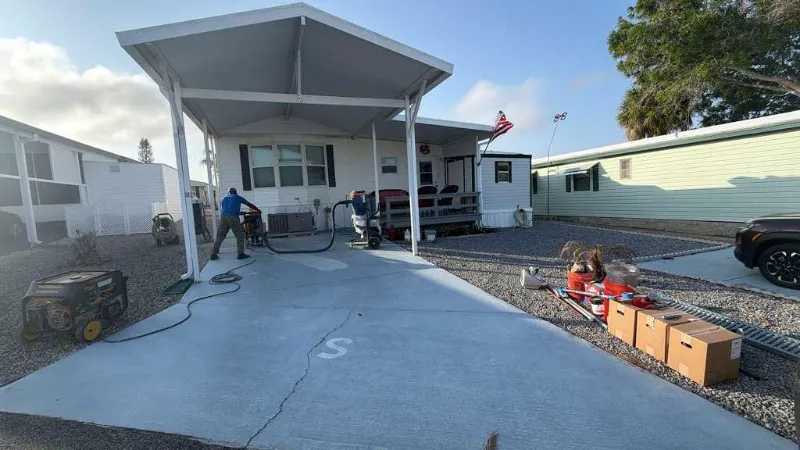Cracked carport concrete before coating