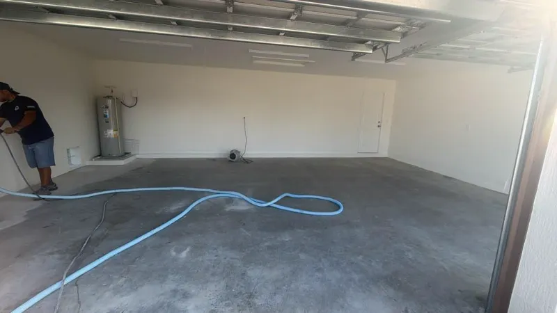 Vacuuming a diamond-ground garage floor before epoxy application