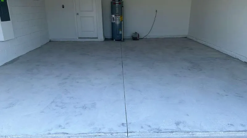 Clean, diamond-ground garage concrete ready for epoxy