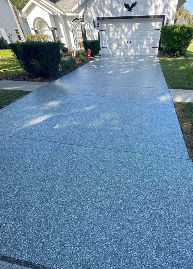 Gray flake epoxy driveway installed by Epoxy One