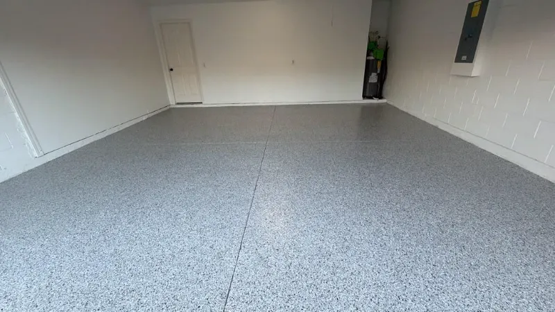 Gray epoxy flake garage floor installed by Epoxy One