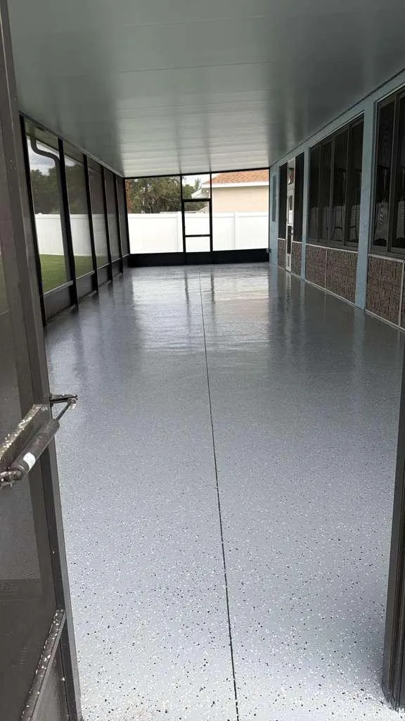 Gray flake epoxy screened lanai installed by Epoxy One