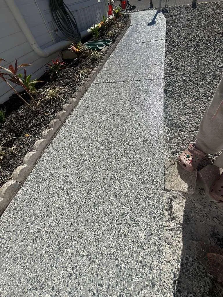 Gray flake epoxy walkway installed by Epoxy One